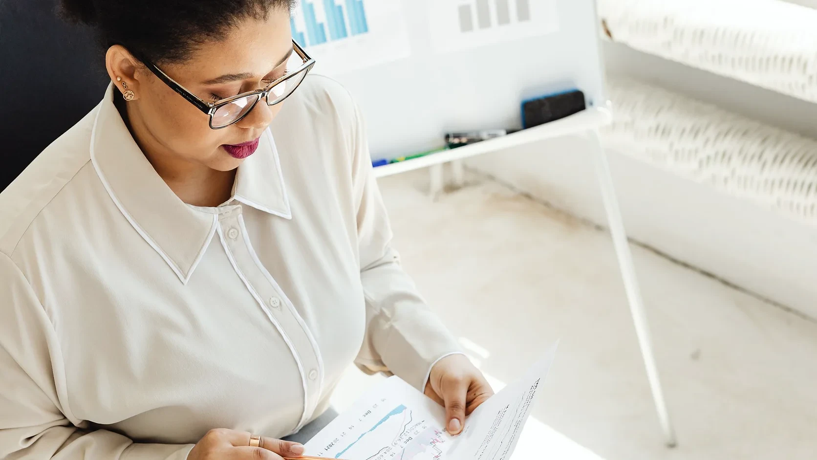 Finance professional reviewing payment and performance documents