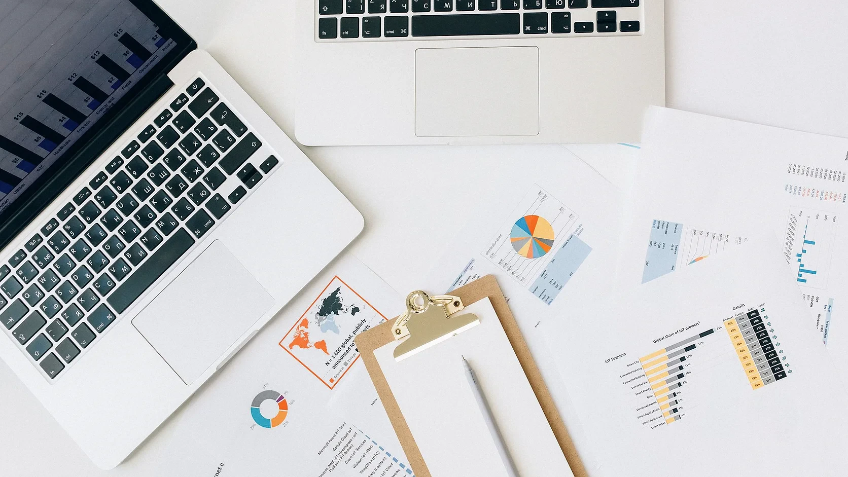 Financial reports and laptops arranged for business performance analysis